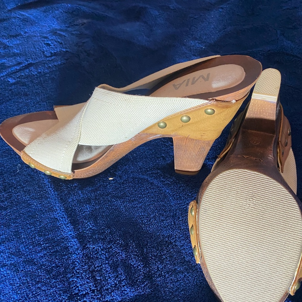 Slip on sandals with wood heel